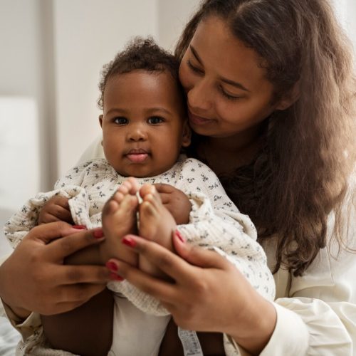 black-mother-taking-car-her-child_23-2149836826